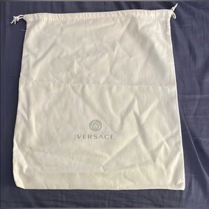 Versace Cream Dust Bag
14X16.5 approx
